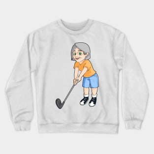 Woman golfing for fitness and fun Crewneck Sweatshirt